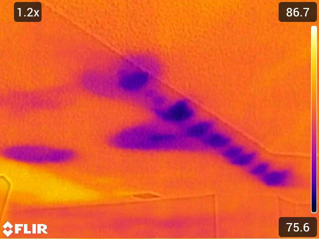 Thermal infrared leak detection scan showing hidden moisture
